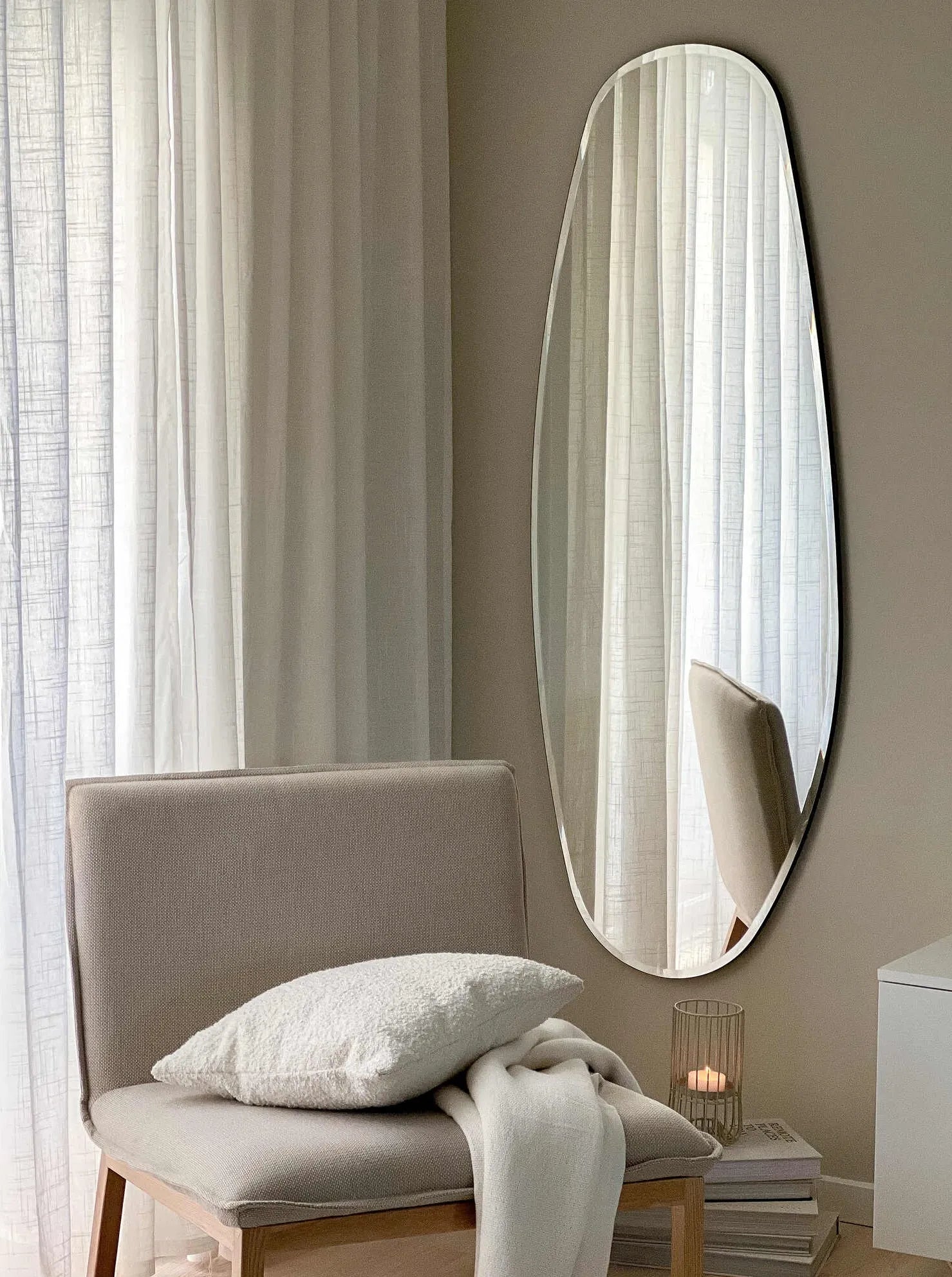 Opal Mirror Large featured in a cozy, Scandinavian-inspired living room