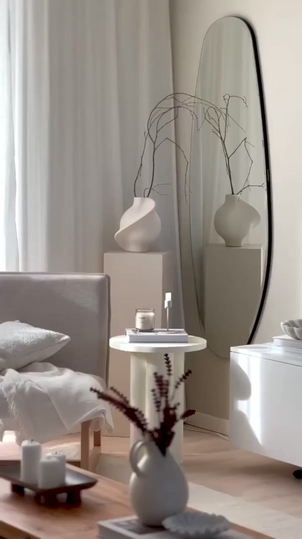 Opal Mirror Large featured in a cozy, Scandinavian-inspired living room