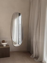 Opal Mirror Large in room next to curtains